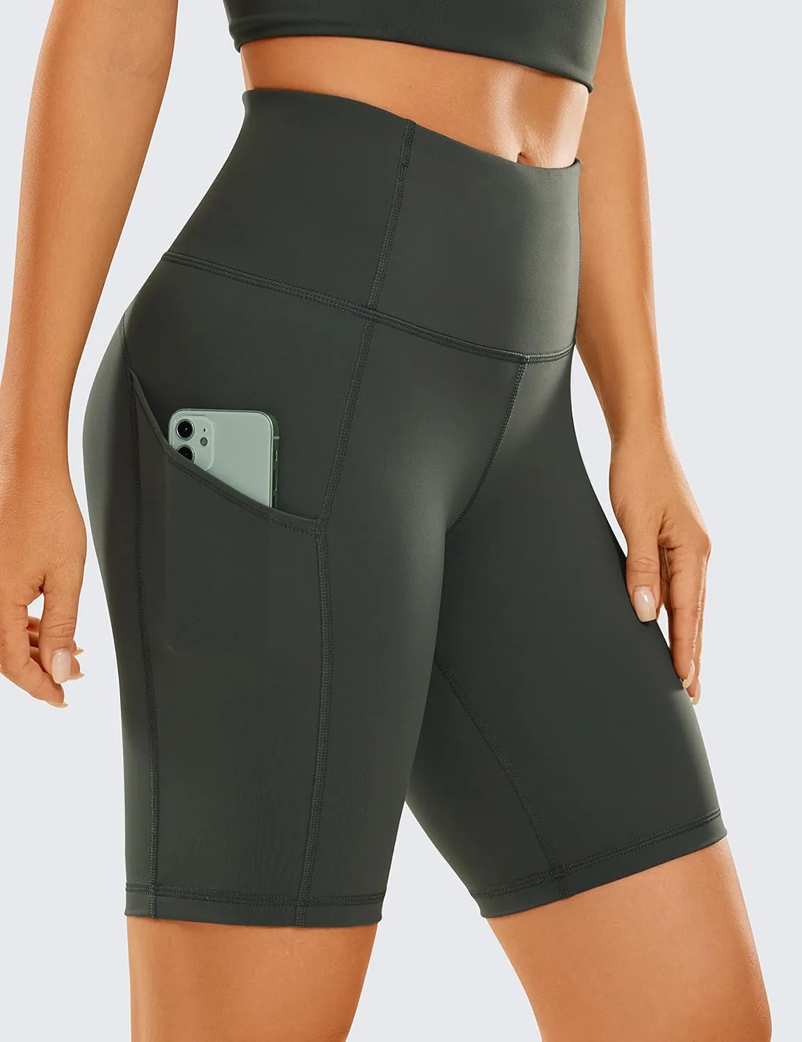 CRZ YOGA Womens Naked Feeling Light Biker Shorts with Pockets 8 Inches - High Waisted Workout Athletic Running Yoga Shorts