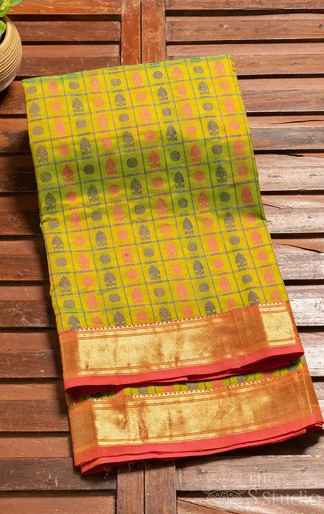 Light green aayiram butta silk cotton saree with zari border